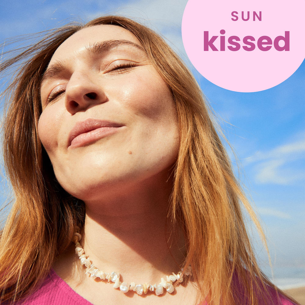 Hawaiian Tropic Tropical Lip Balm SPF 30 — twist-top design, quick access during beach days.