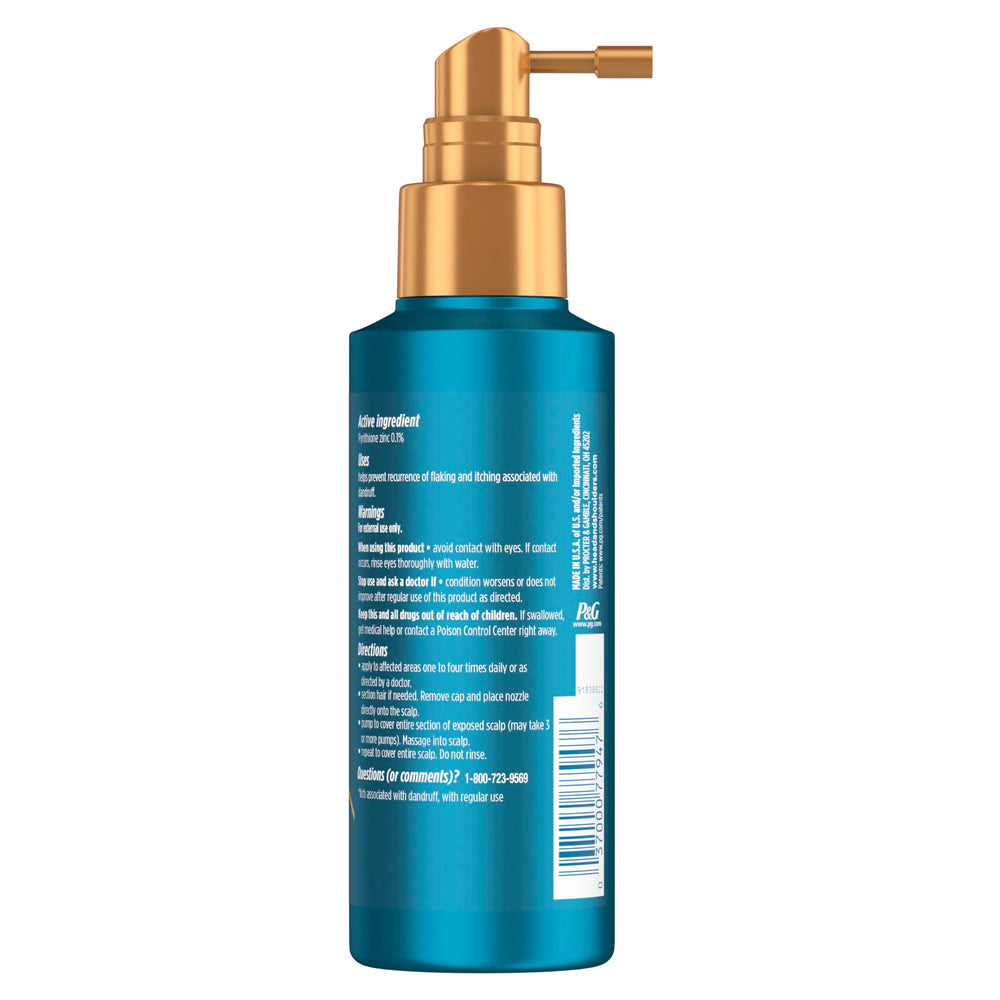 Bottle pour of Royal Oils Elixir for precise scalp application