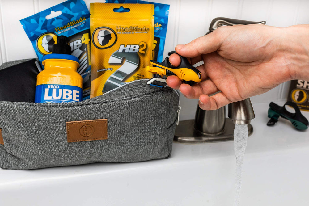 HeadBlade HB4 cartridge close-up highlighting stainless steel blades for tug-free comfort.
