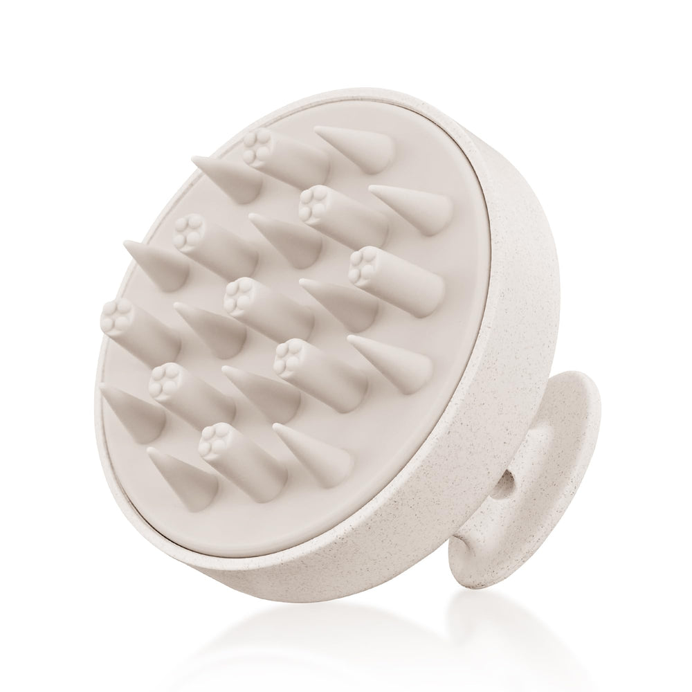 HEETA hair scalp massager with soft silicone bristles for a gentle cleanse