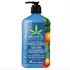 Hempz Biotin Conditioner bottle-front demonstrates triple moisture for hydrated hair.
