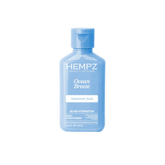 Hempz Loción corporal Ocean Breeze mini en envase, ideal para hidratación diaria.