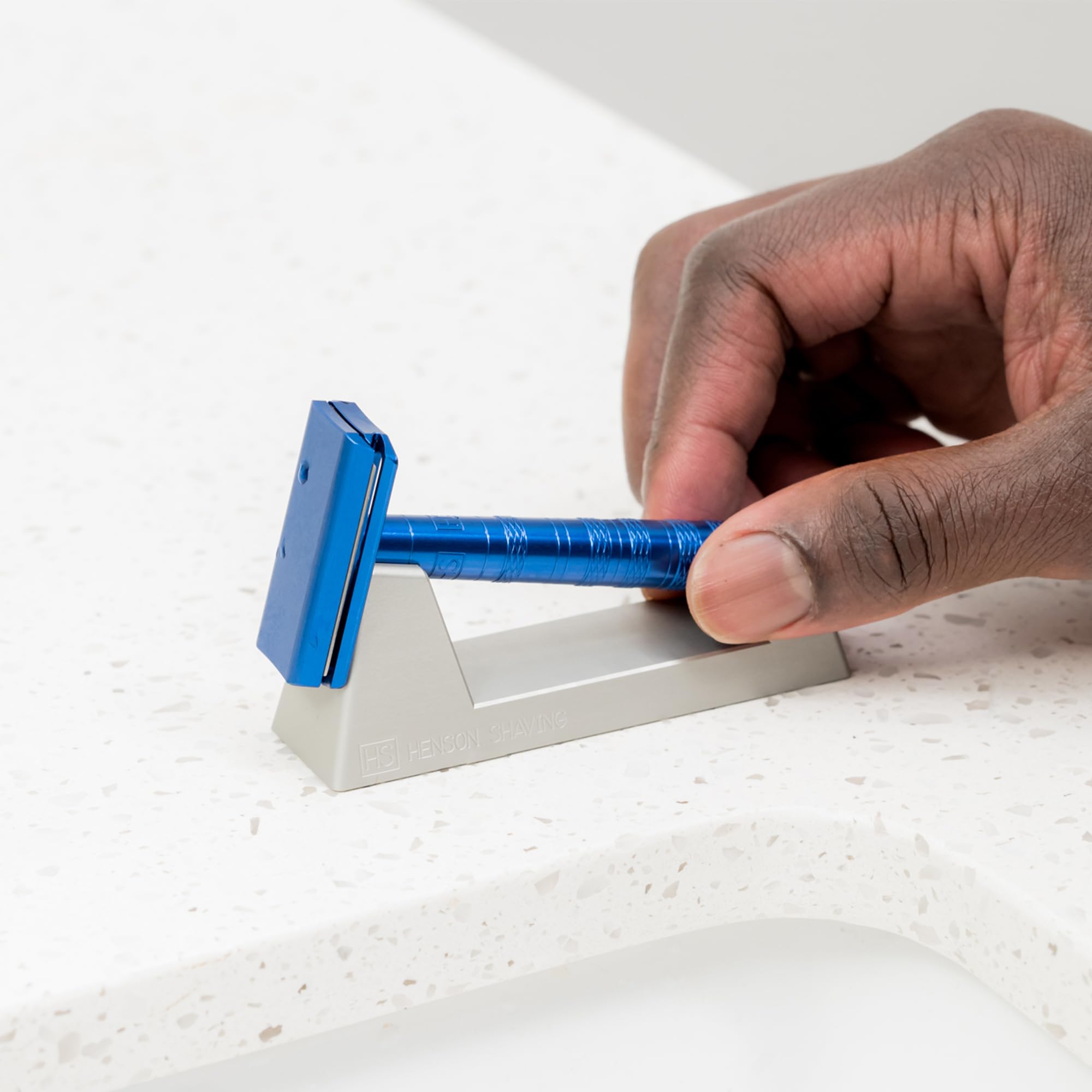 Henson Razor Stand showcases anodized-finish for scratch resistance.