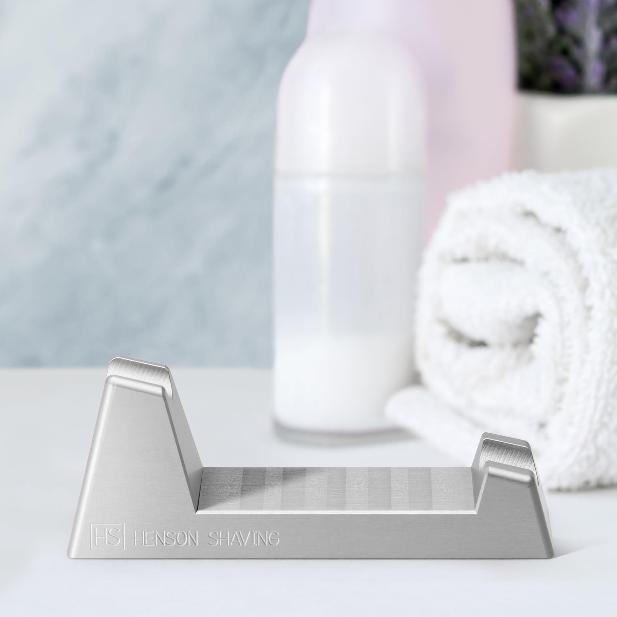 Henson Razor Stand lightweight-design minimizes clutter on the vanity.
