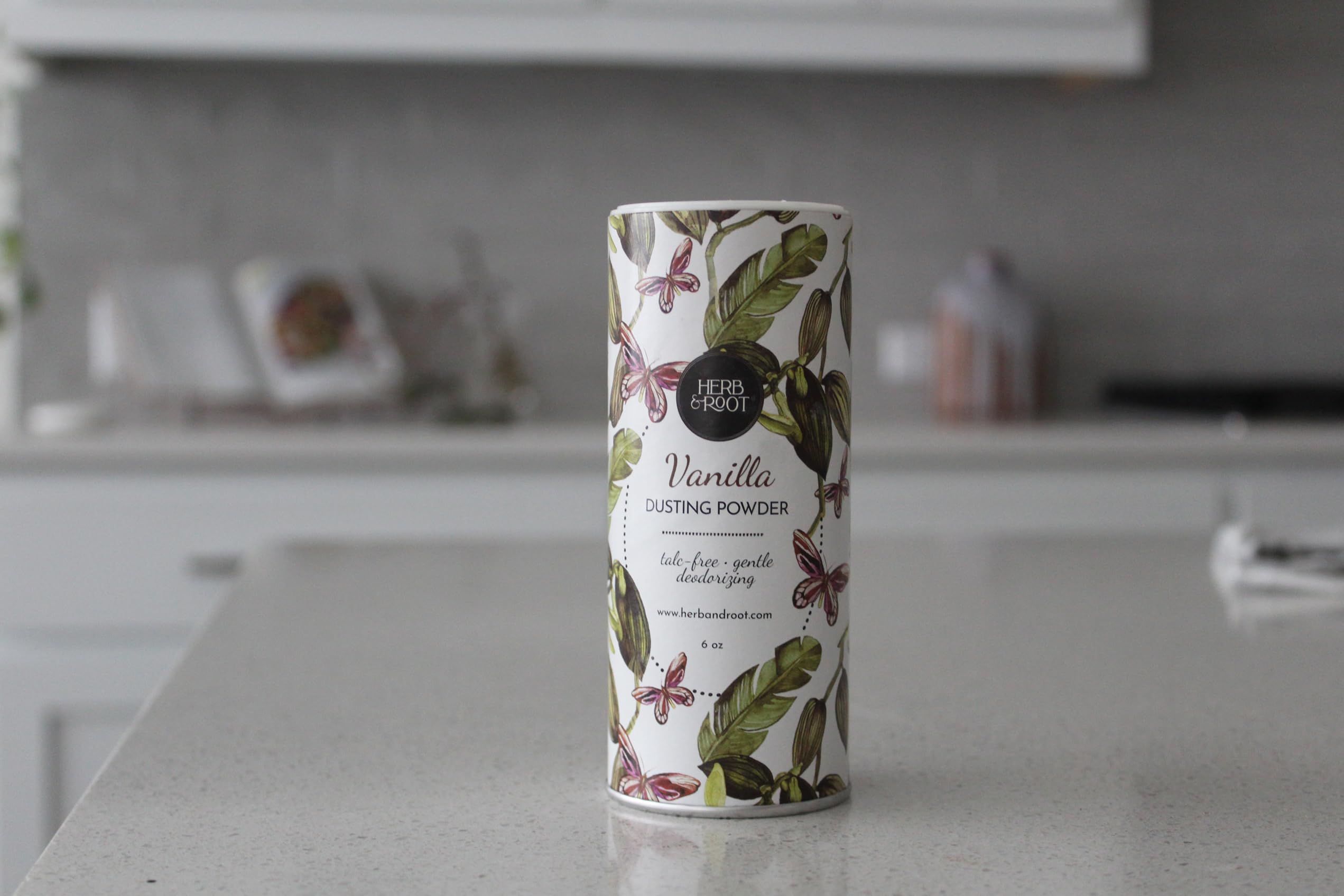Herb & Root jasmine talc-free powder offering light, uplifting fragrance.
