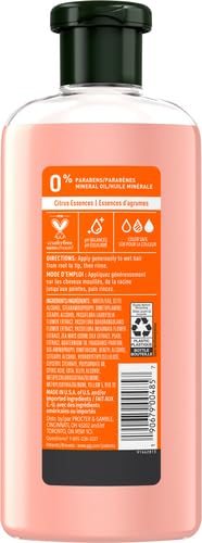 Herbal Essences Body Envy application demonstrates lightweight volumizing formula.