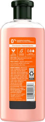 Herbal Essences Body Envy application demonstrates lightweight volumizing formula.