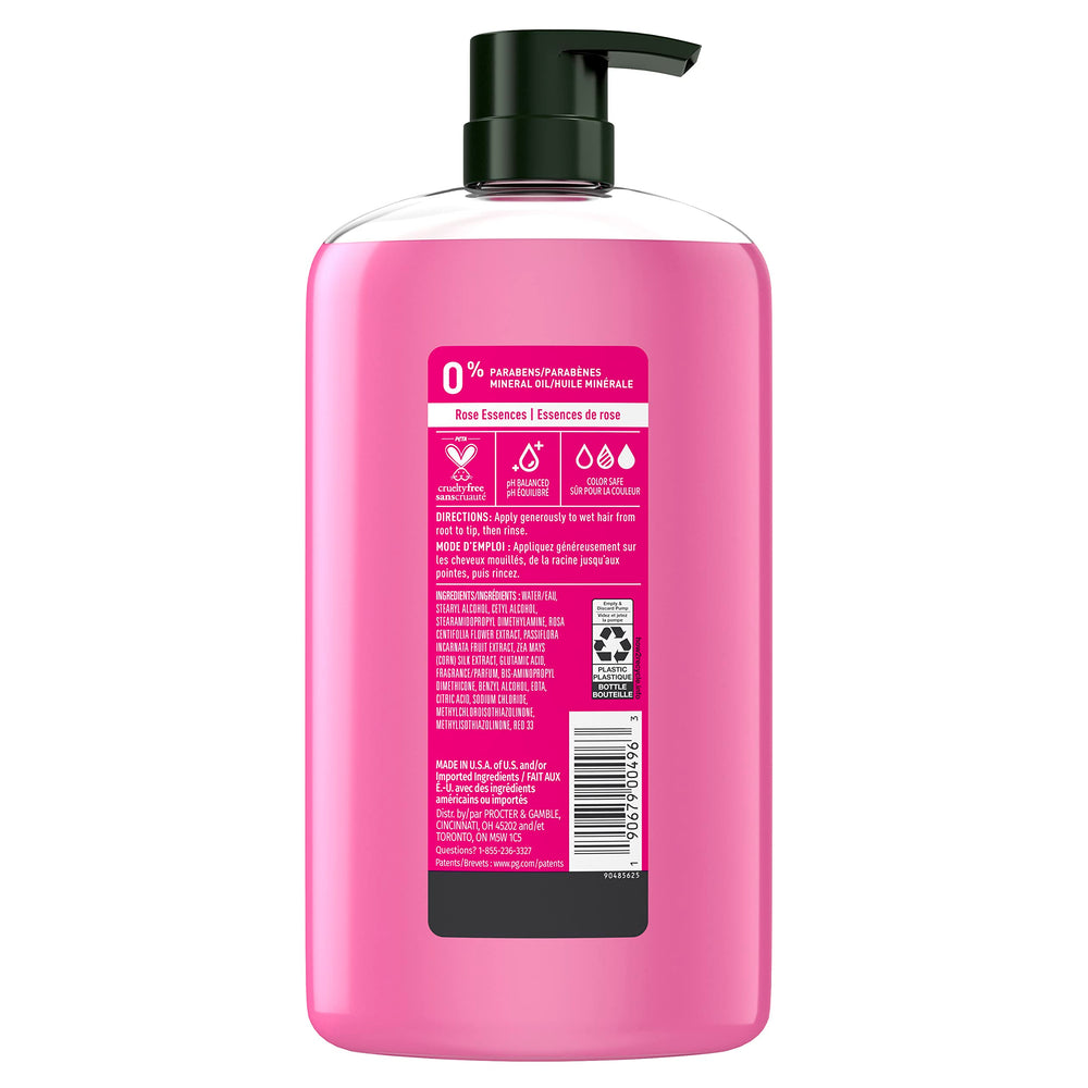 Herbal Essences Color Me Happy conditioner being poured for quick detangling