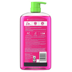 Herbal Essences Color Me Happy being poured into hand for easy distribution.