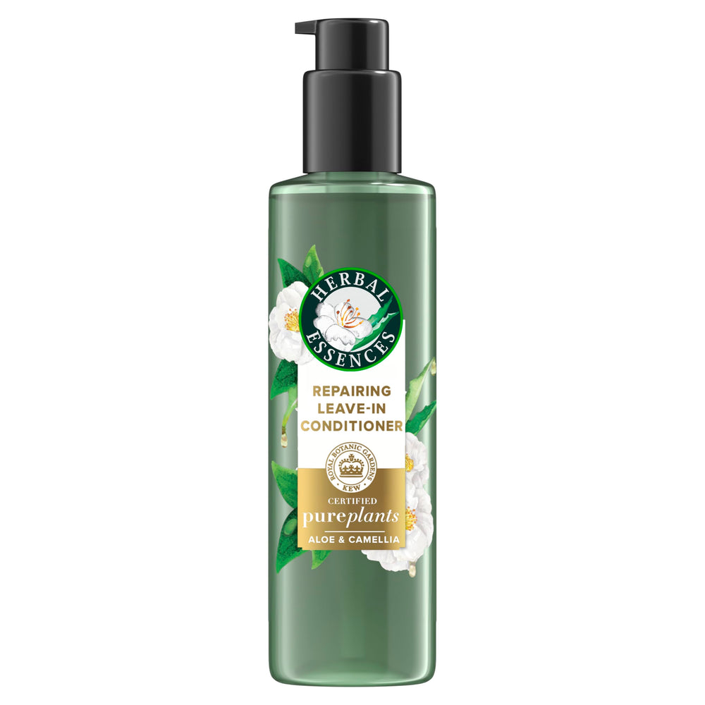 Acondicionador sin enjuague Herbal Essences Repairing, botella visible, cabello suave y nutrido.