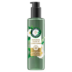 Acondicionador sin enjuague Herbal Essences Repairing, botella visible, cabello suave y nutrido.