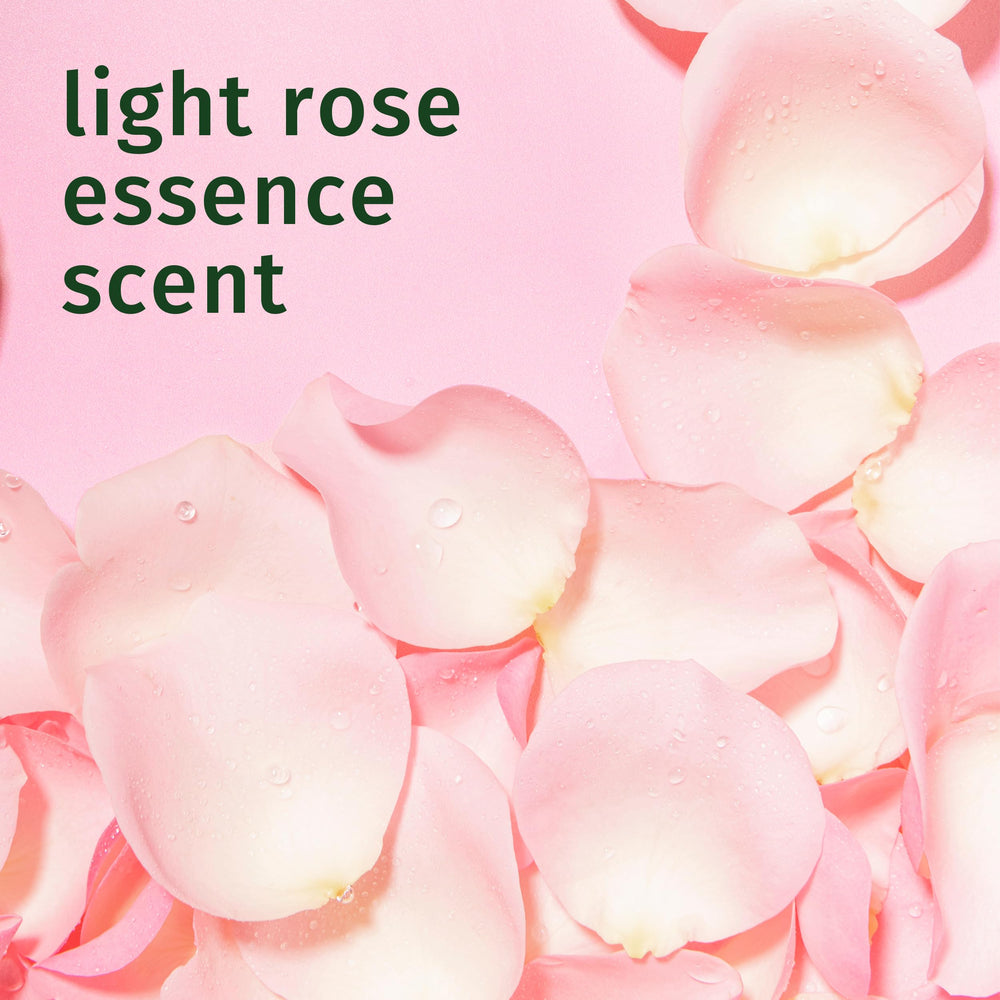 Aromas florales de rosa en el acondicionador Herbal Essences.