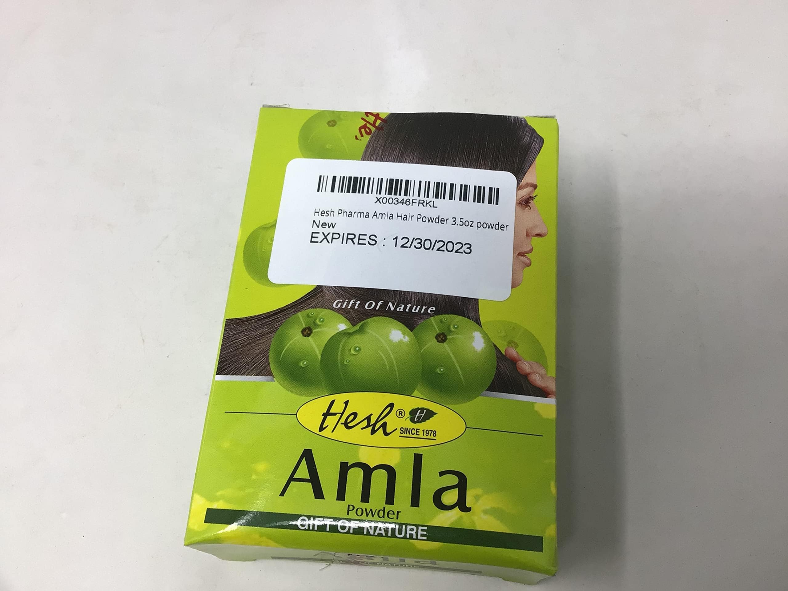 Polvo fino de Amla de Hesh Pharma para aplicación suave en el cabello.