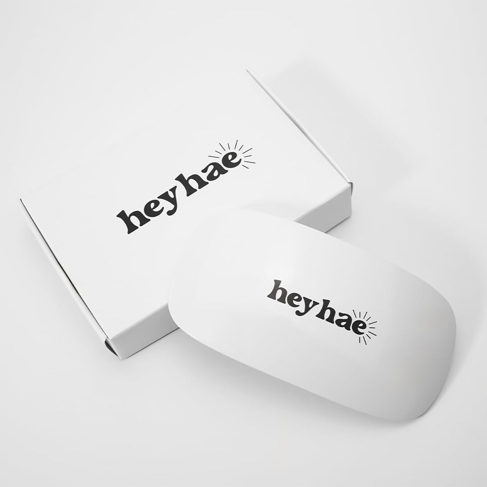 Heyhae LED lamp performing top gel cure for a glossy finish
