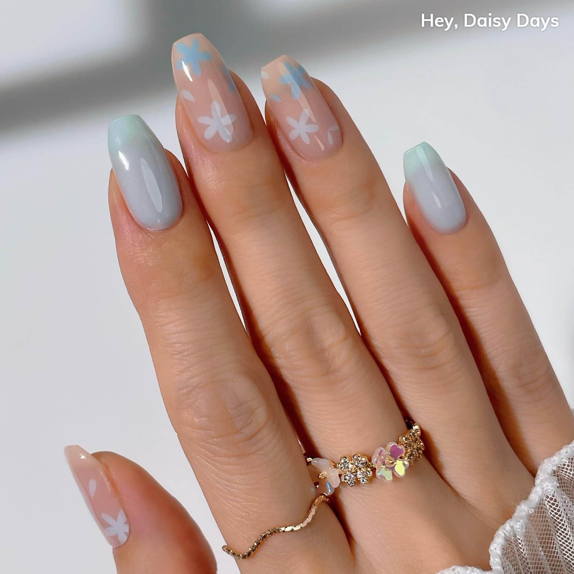Heyhae Spring Marble Pink close‑up with soft florals and daisies