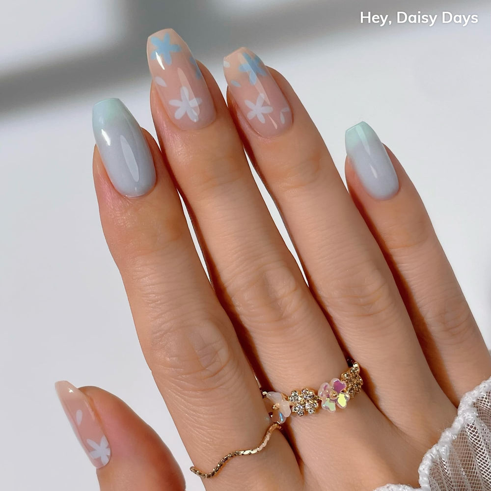 Heyhae Spring Marble Pink close‑up with soft florals and daisies
