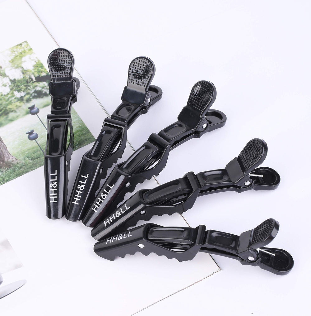 HH&LL multipurpose clip holds sections without pulling or denting hair.