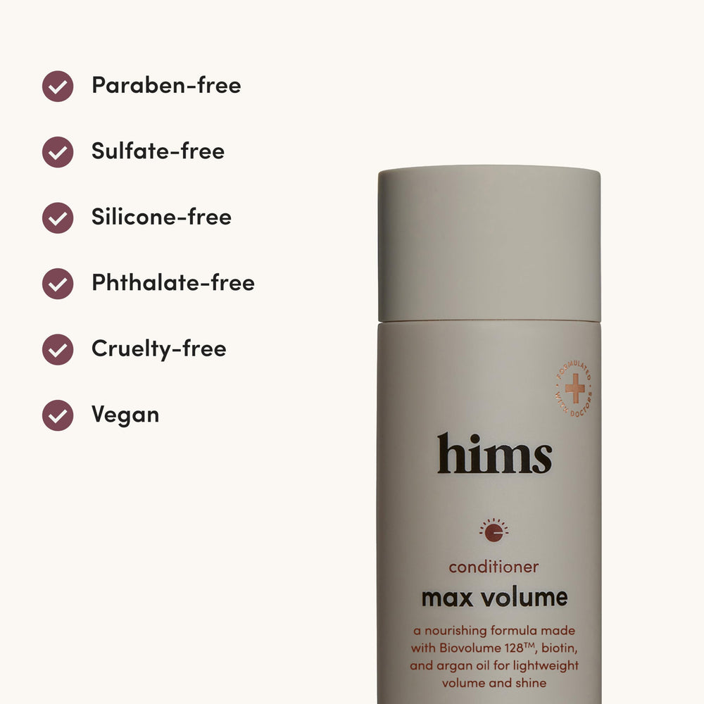 Rinsing Hims Max Volume Conditioner from damp hair