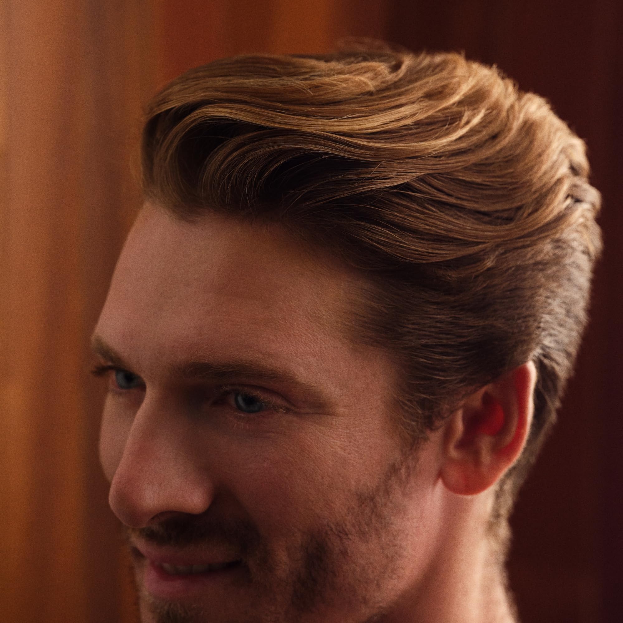 Hims Minoxidil serum dropper showing precise dosage for consistent use.