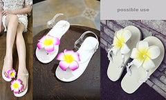 HipGirl flor hawaiana azul en clip, ideal para luau y fiestas temáticas.