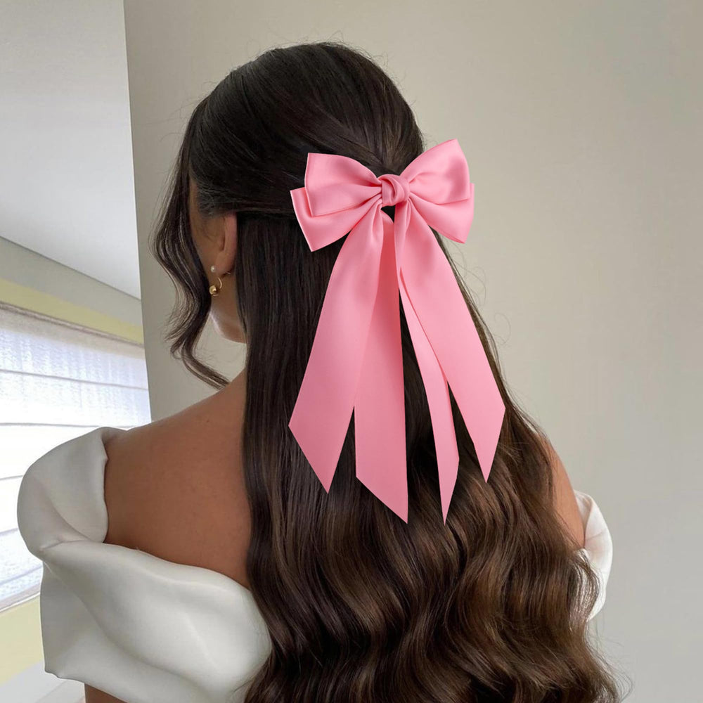 Hisial lazo de pelo rojo añade color a cualquier peinado