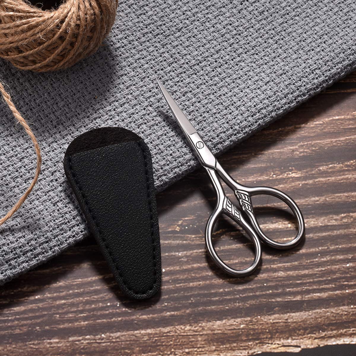 Hitopty scissors with PU sheath ideal for travel and on-the-go grooming.