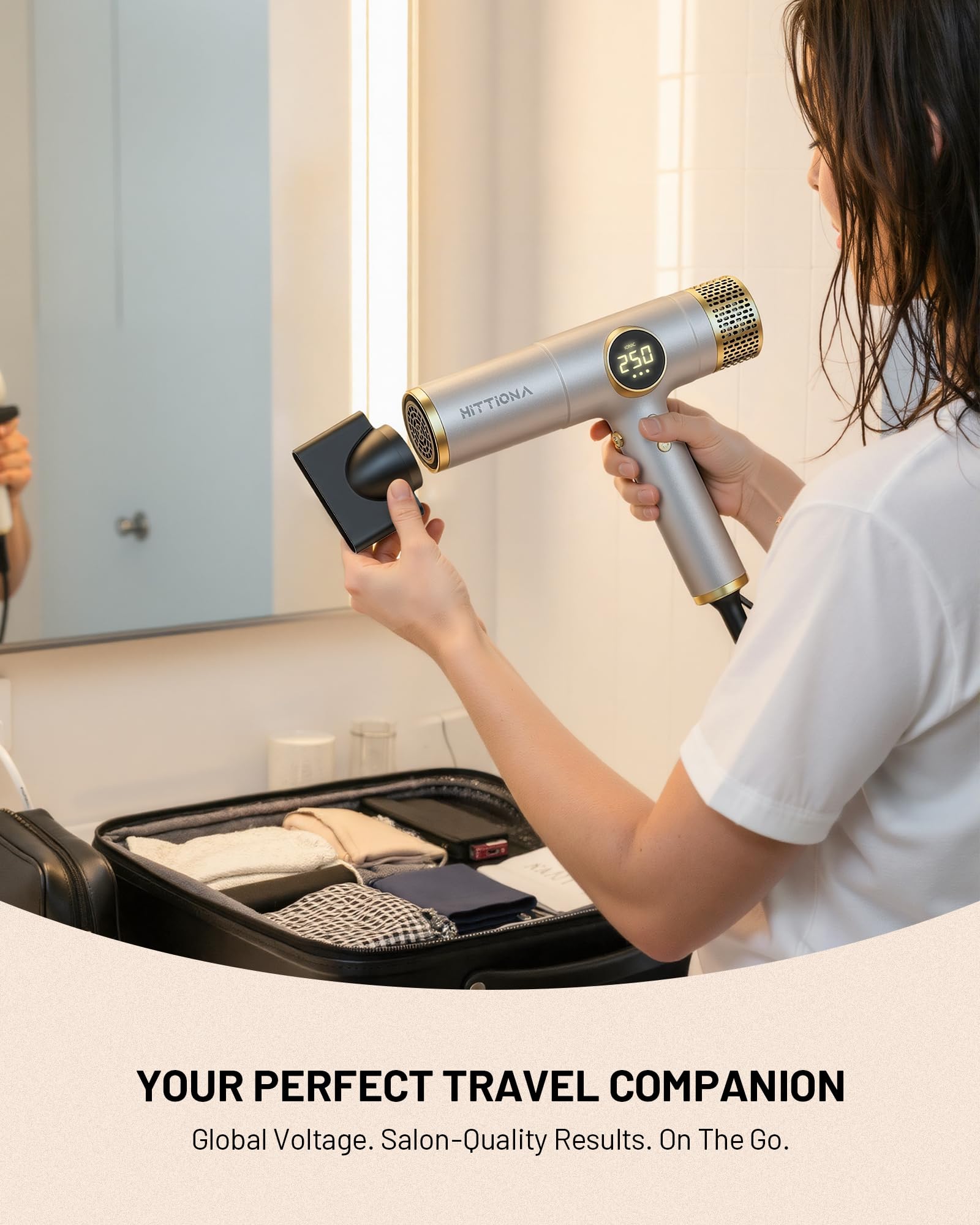 Hittiona travel dryer with diffuser attached, enhances curls with gentle, defined airflow.