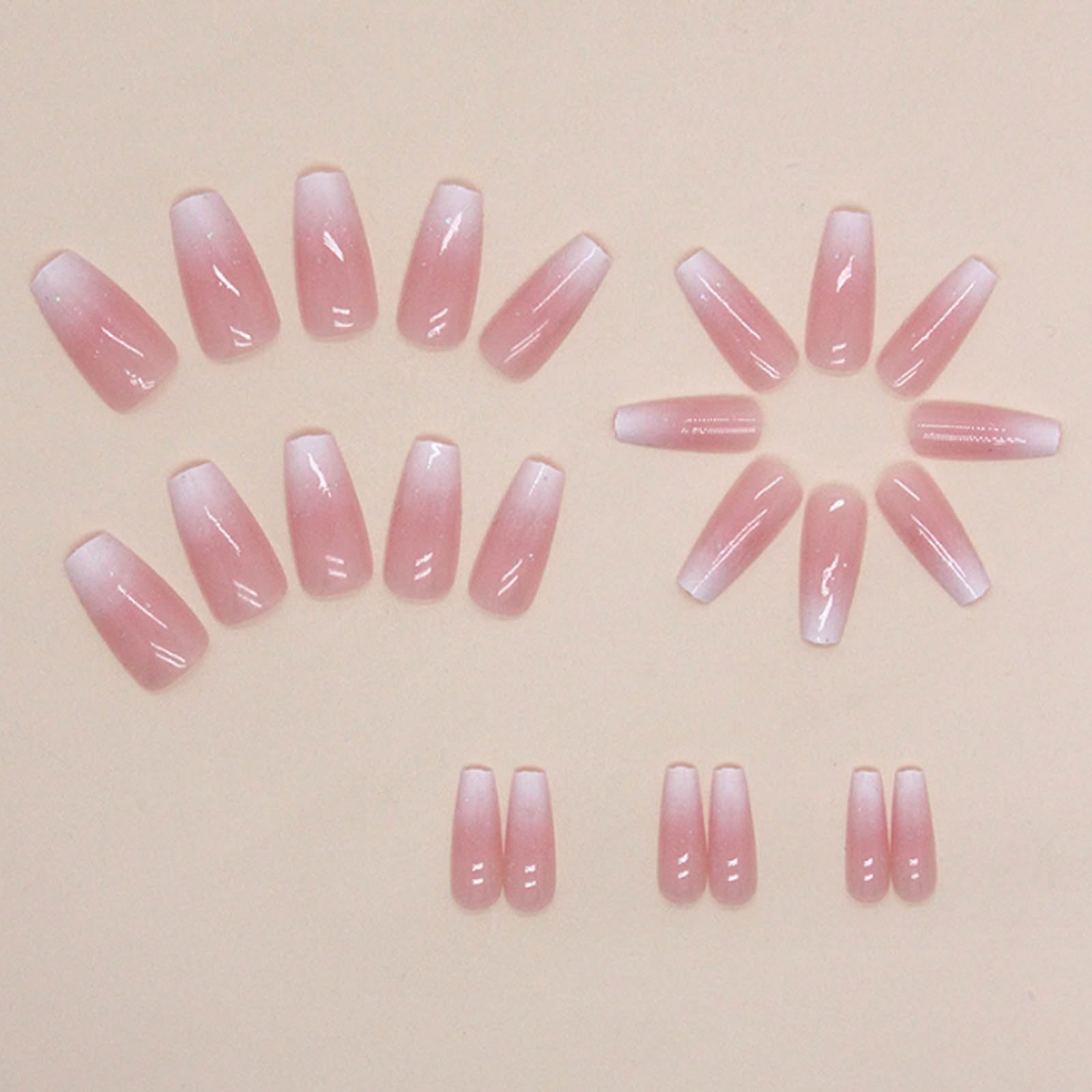 Close-up of Hkanlre coffin nails with pink gradient design