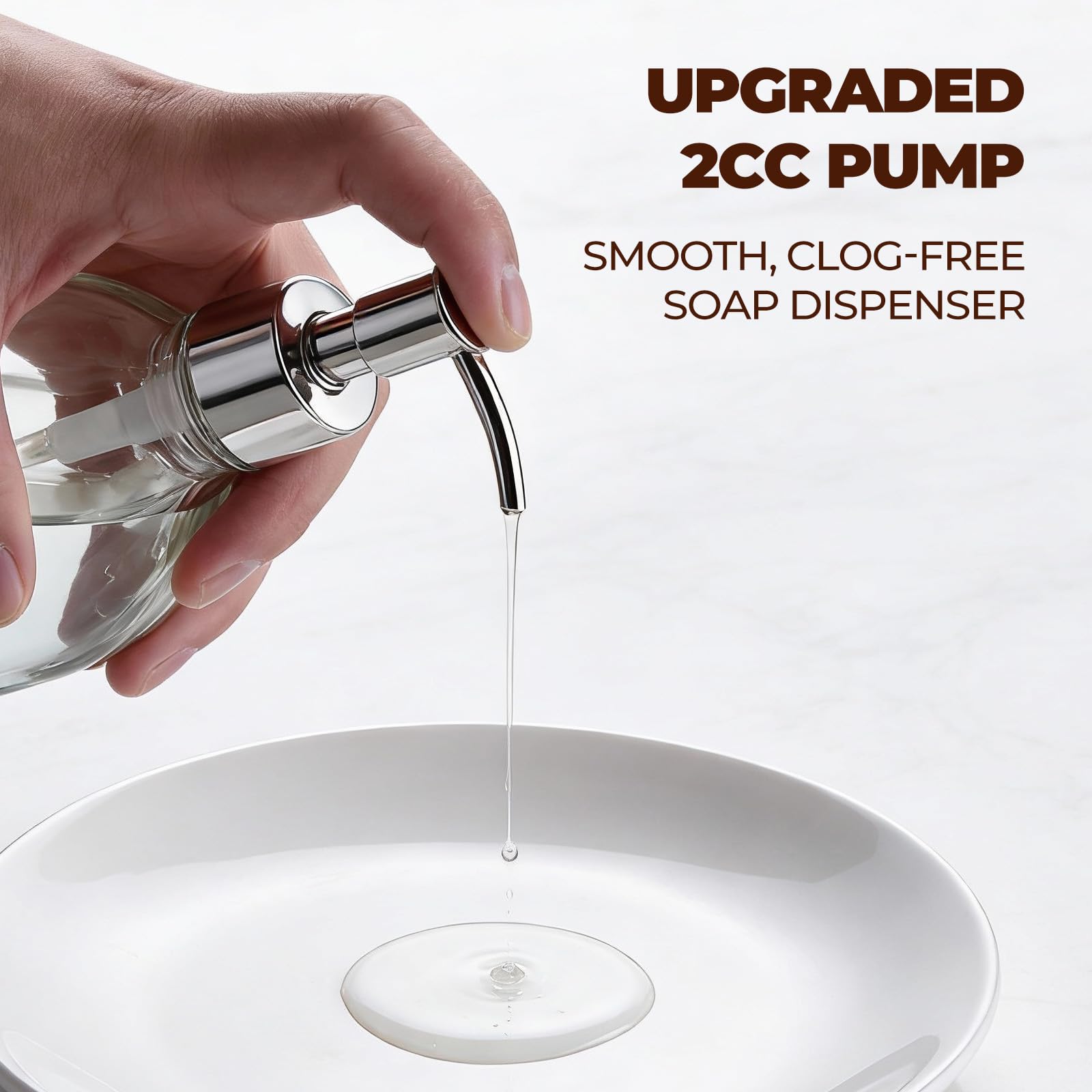 HomePicker glass soap dispenser with silver pump on bathroom counter