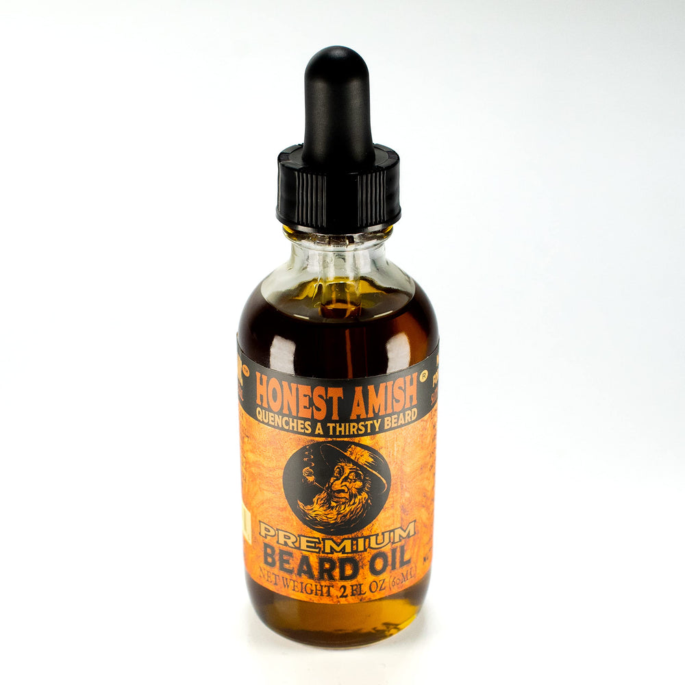 Honest Amish Premium Beard Oil pour demonstrates easy application for conditioning.