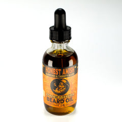 Honest Amish Premium Beard Oil pour demonstrates easy application for conditioning.