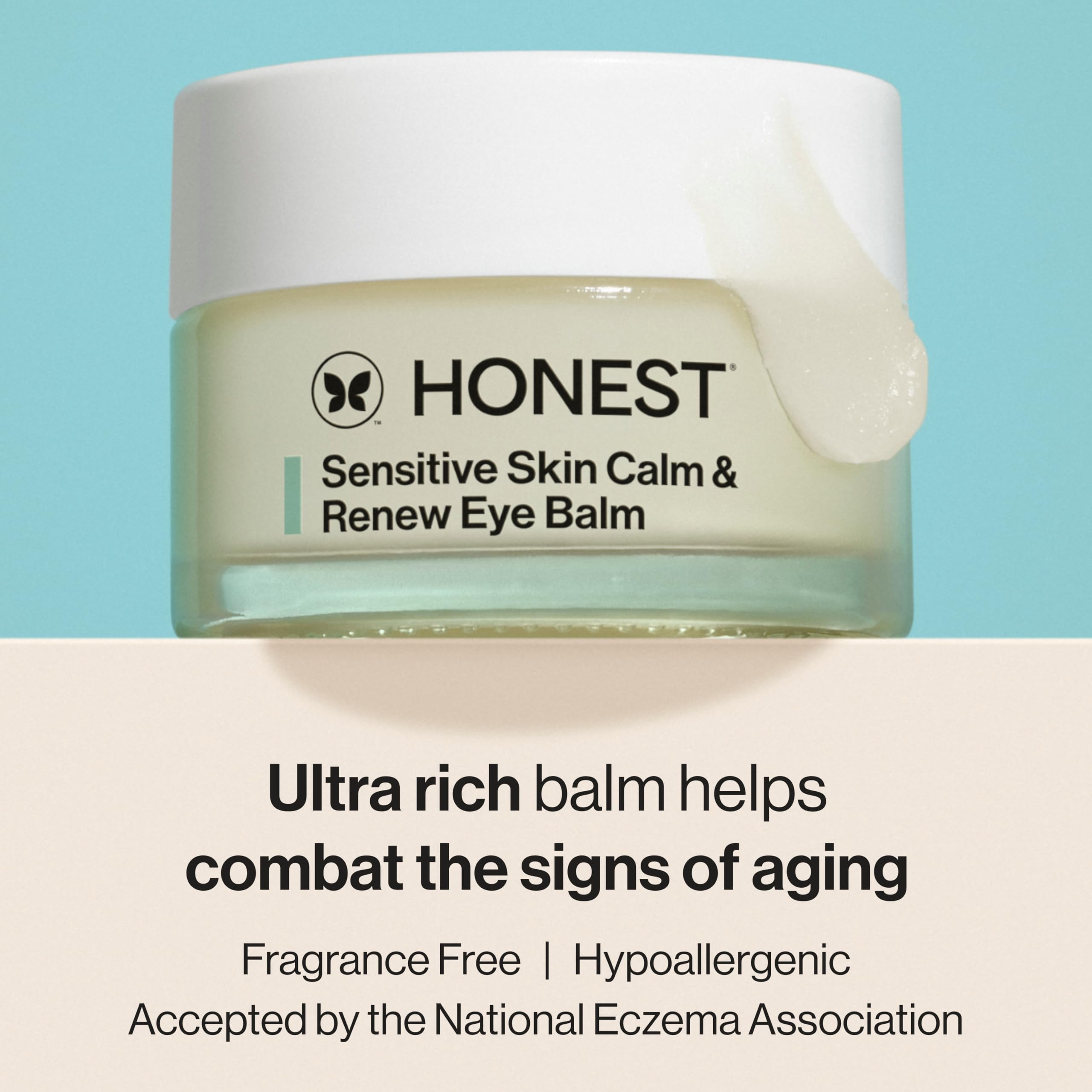 Honest Beauty Eye Balm application close-up highlights nourishing cream on the delicate eye area