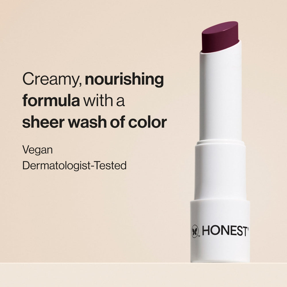 Honest Beauty Plum Drop Balm application shows smooth glide and even tint.