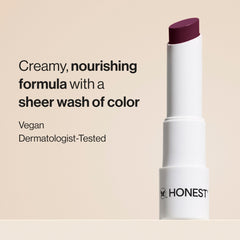Honest Beauty Plum Drop Balm application shows smooth glide and even tint.