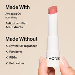 Honest Beauty Summer Melon adds pink blush to bare lips with subtle hydration.