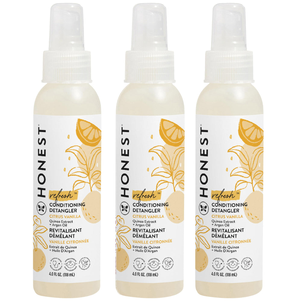 The Honest Company Conditioning Detangler spray bottle for easy detangling across hair types.