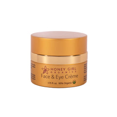 Honey Girl Organics Face & Eye Creme bottle close-up for daily hydration