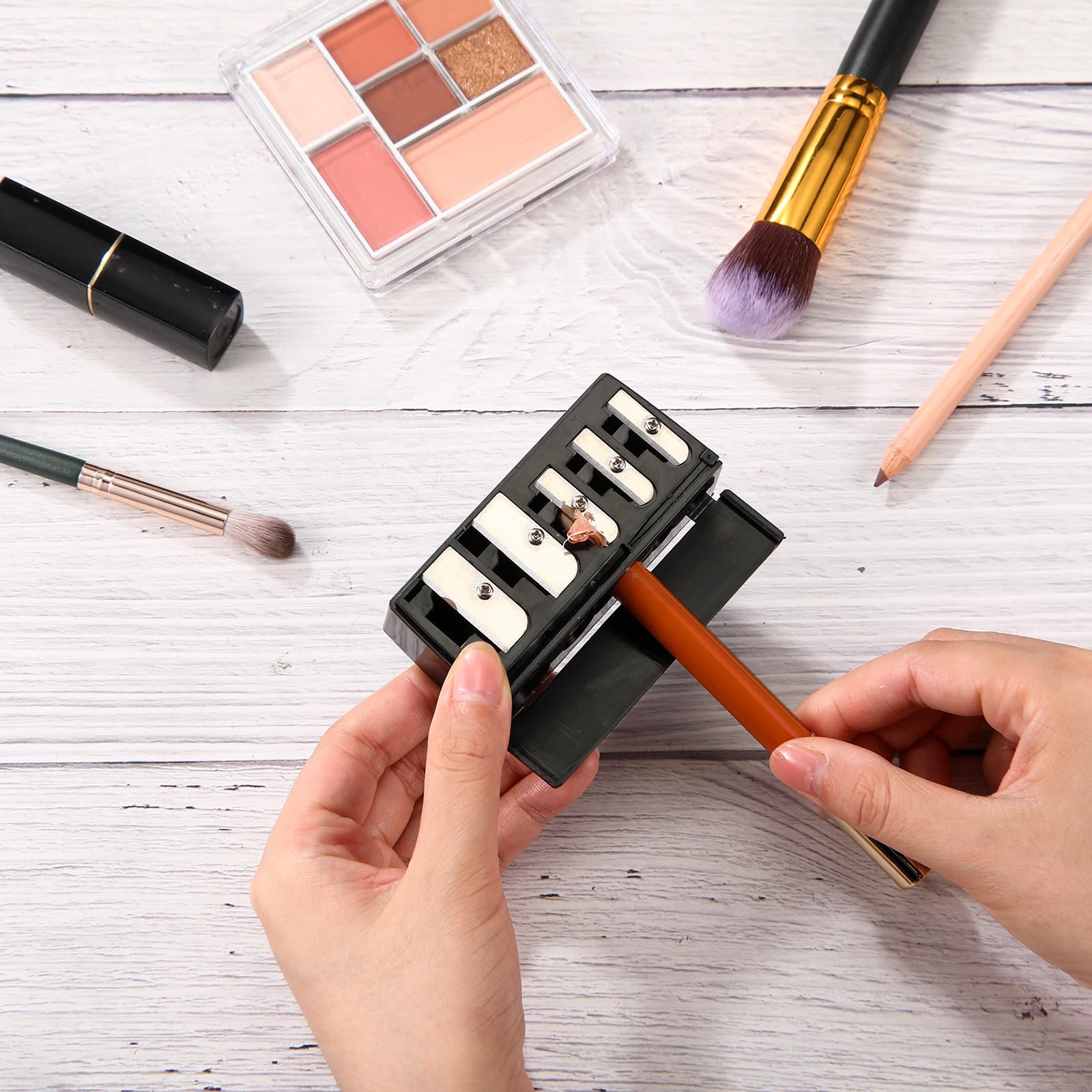 Honoson compact travel sharpener fits easily in a cosmetic bag.
