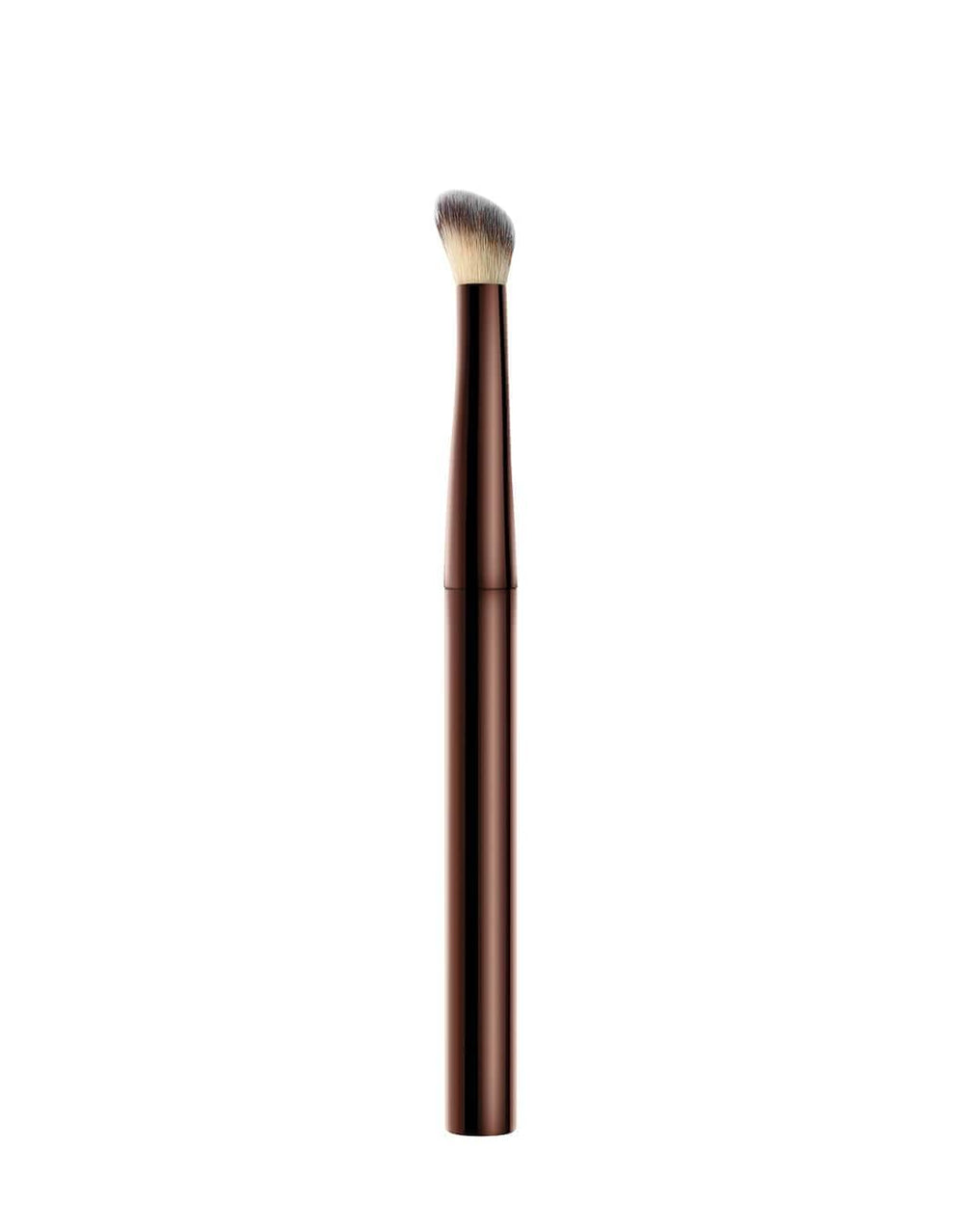 Hourglass Vanish Concealer Brush half-moon design reaches corners for even coverage