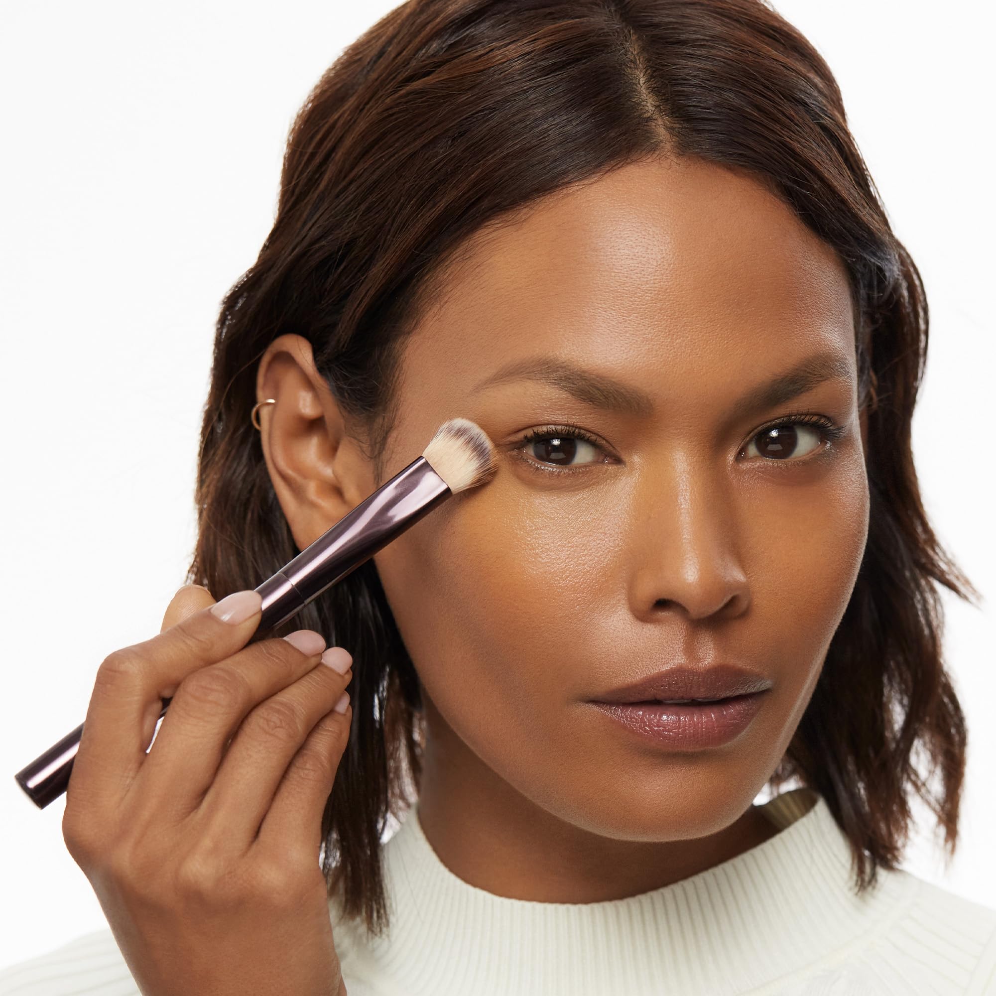 Hourglass Vanish Concealer Brush weighted handle enables pro-level precision