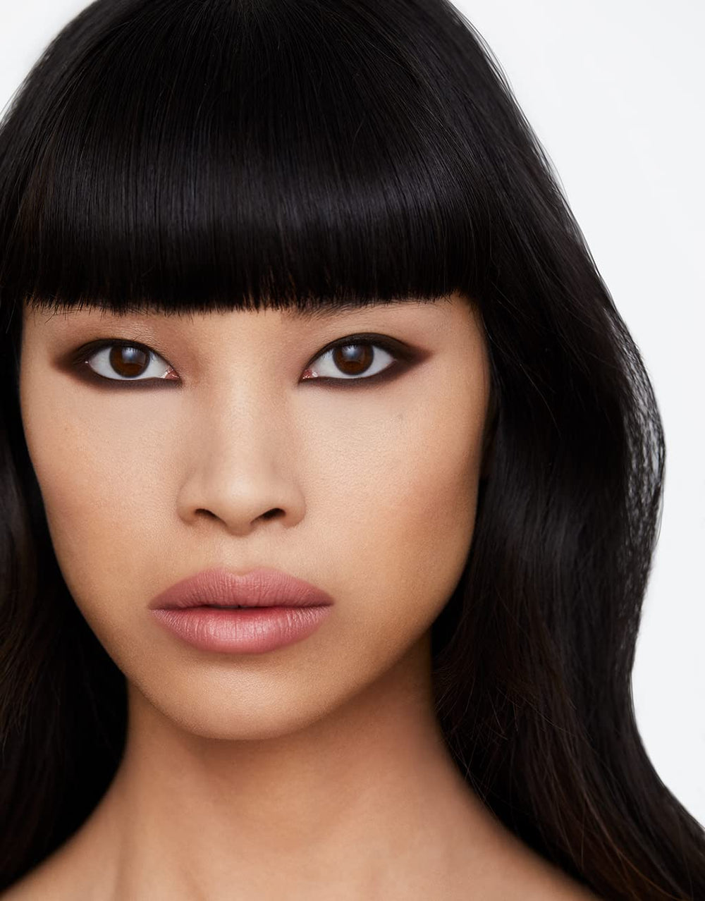 Hourglass Voyeur Cave swatch shows bold pigment with one-swipe payoff.
