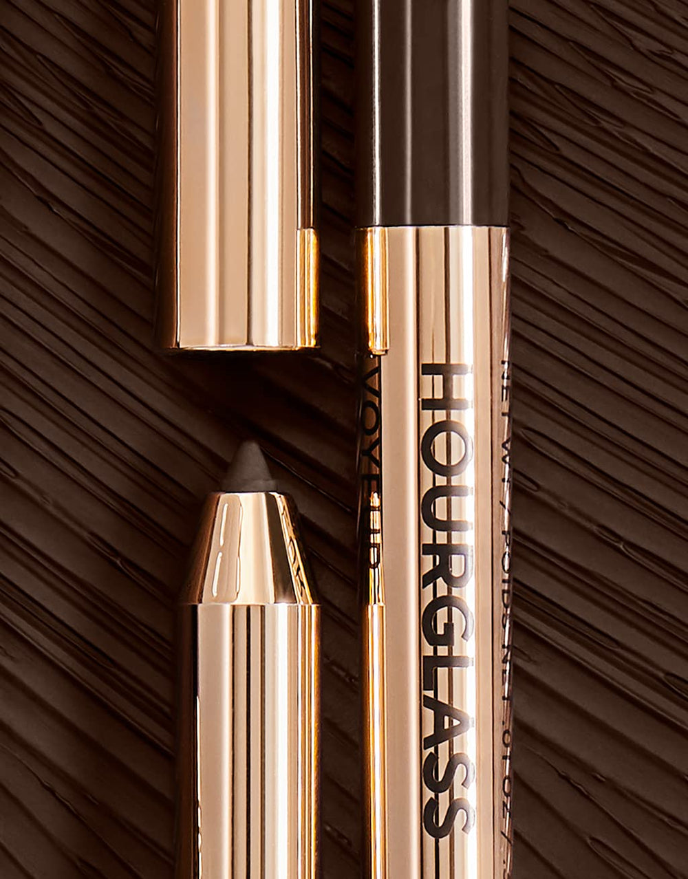 Hourglass Voyeur Cave creamy glide for precise, easy application.