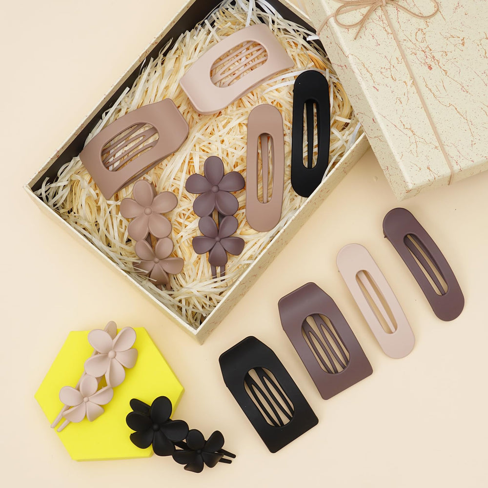 HQ-SITE flower pin set in black for delicate hair accents.