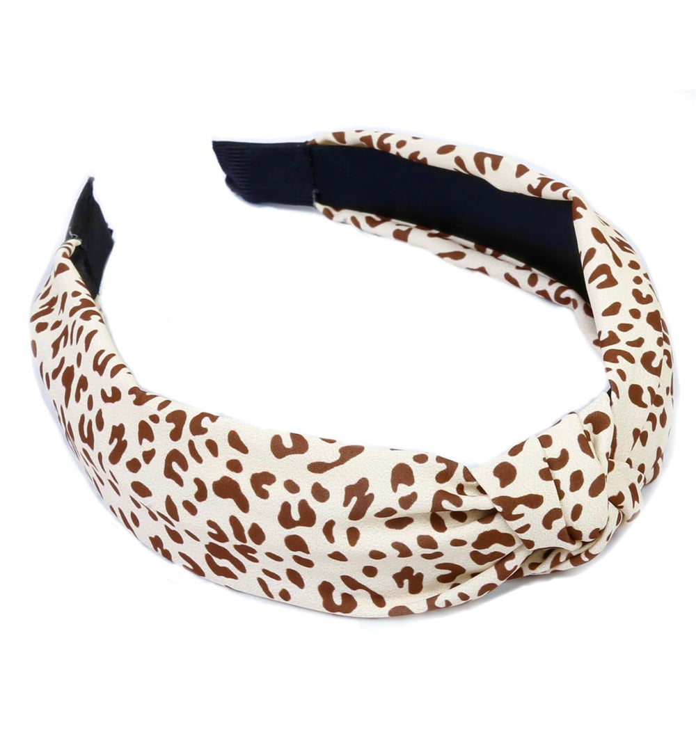 Huachi banda nudo leopardo crema, aporta sofisticación sin esfuerzo diario.