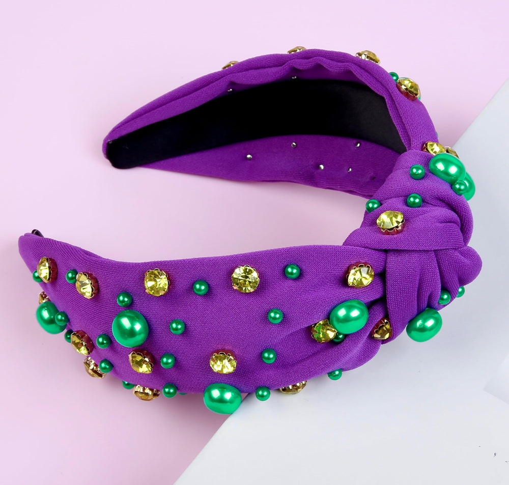Diadema Huachi Mardi Gras con cristales dorados y perlas verdes, brillo festivo.