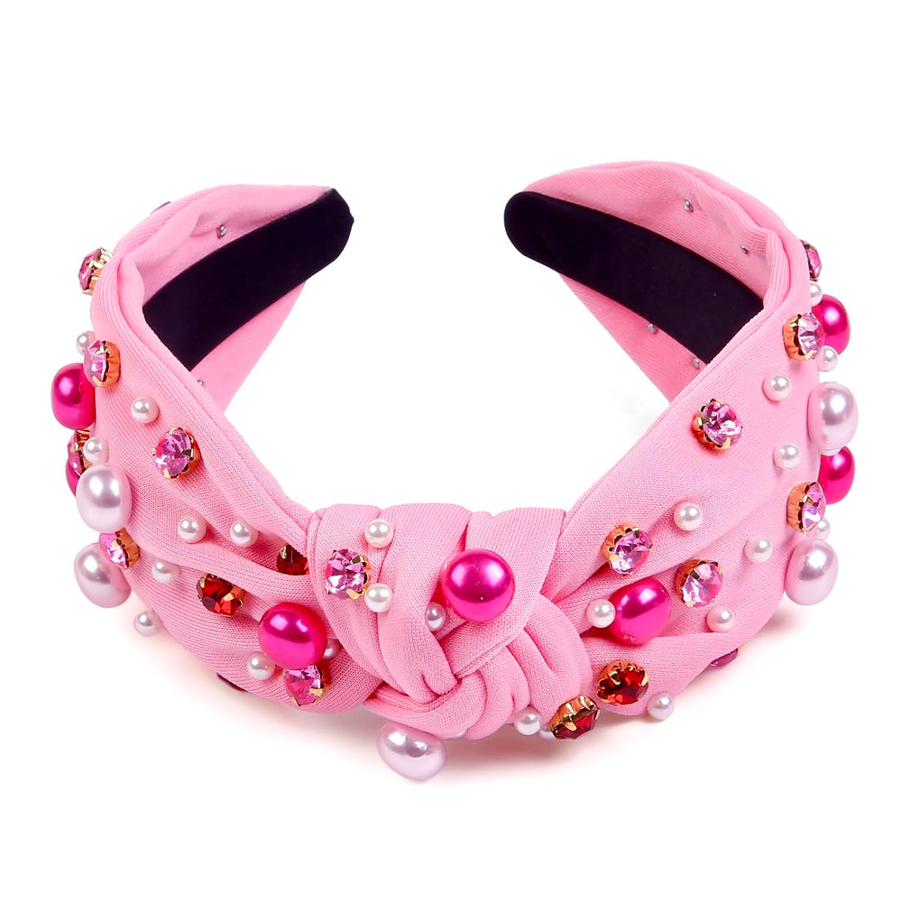 Diadema Huachi nudo destacado con perlas para elegancia.