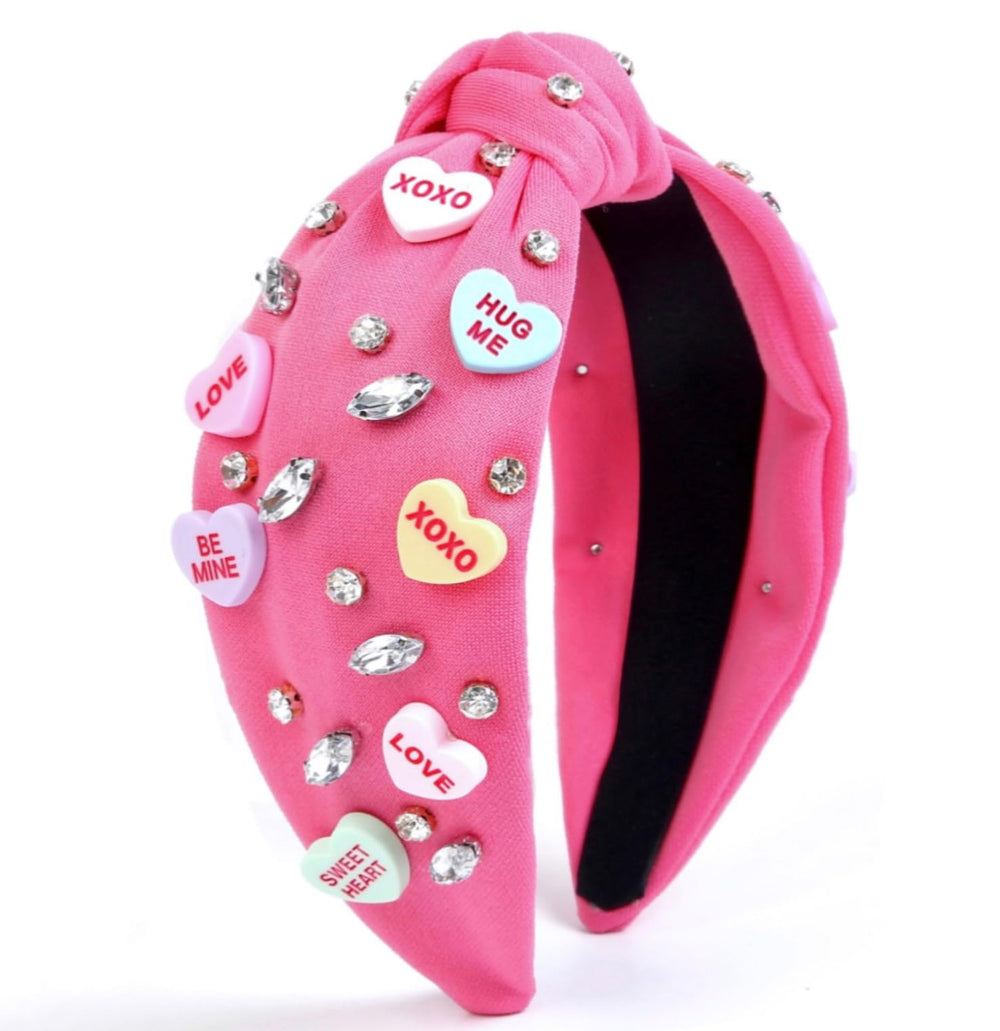 Huachi diadema San Valentín con nudo rosado y pedrería, para look romántico.