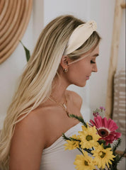 Huachi knotted headband black offers bold contrast and all-day comfort