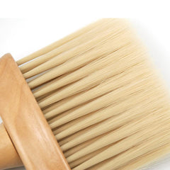 HUAYINGMEI neck-dusting brush in action assists clean neck areas after trimming.