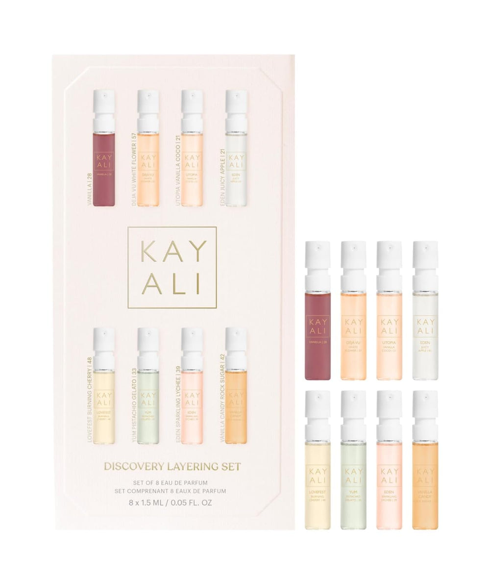 Huda KAYALI Discovery Layering Set with eight 1.5 mL samples for versatile layering.